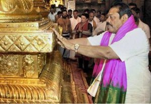 Sri Lankan President Mahinda Rajapaksa offering prayers at the Lord Venkateswara temple at Tirumala in Tirupati on Saturday.— PHOTO: PTI