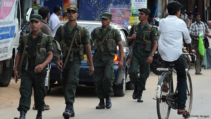 Sri Lankan army troopers patrol in Jaffna, 400 kilometres (250 miles) north of the capital Colombo on September 18, 2013. Sri Lanka is holding the first ever provincial council election, scheduled for September 21. (Photo: AFP)