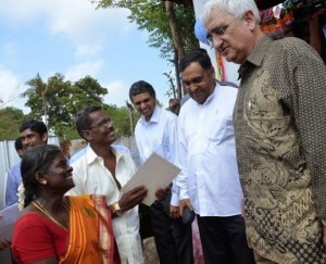 External Affairs Minister Salman Khurshid with beneficiaries of the Indian housing project near Jaffna on Tuesday. India's High Commissioner to Sri Lanka Y.K. Sinha and Deputy High Commissioner P. Kumaran are in the picture. Photo: Meera Srinivasan.