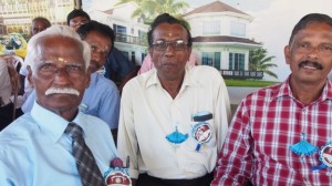 Former teacher Murugesu, left, and Krisnapillai Manoharan, right