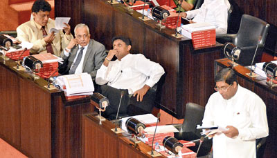 Finance Minister presents the budget.
