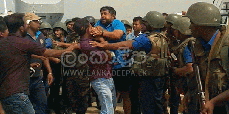 Navy chief goes berserk … manhandles Island/Divaina correspondent at Hambantota Port