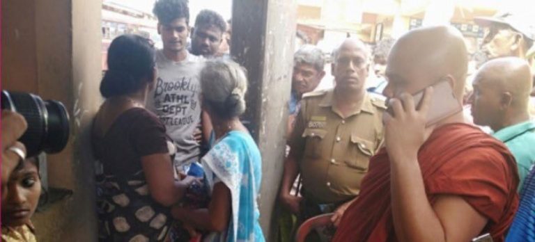 Sri Lanka Police detaining women wearing clothes with “Buddha” like imagery